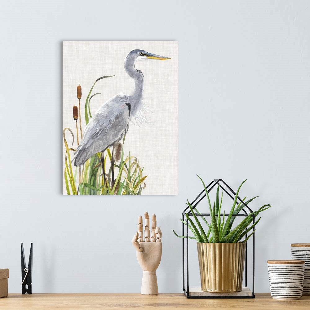 A bohemian room featuring Painting of a heron standing in tall reeds.