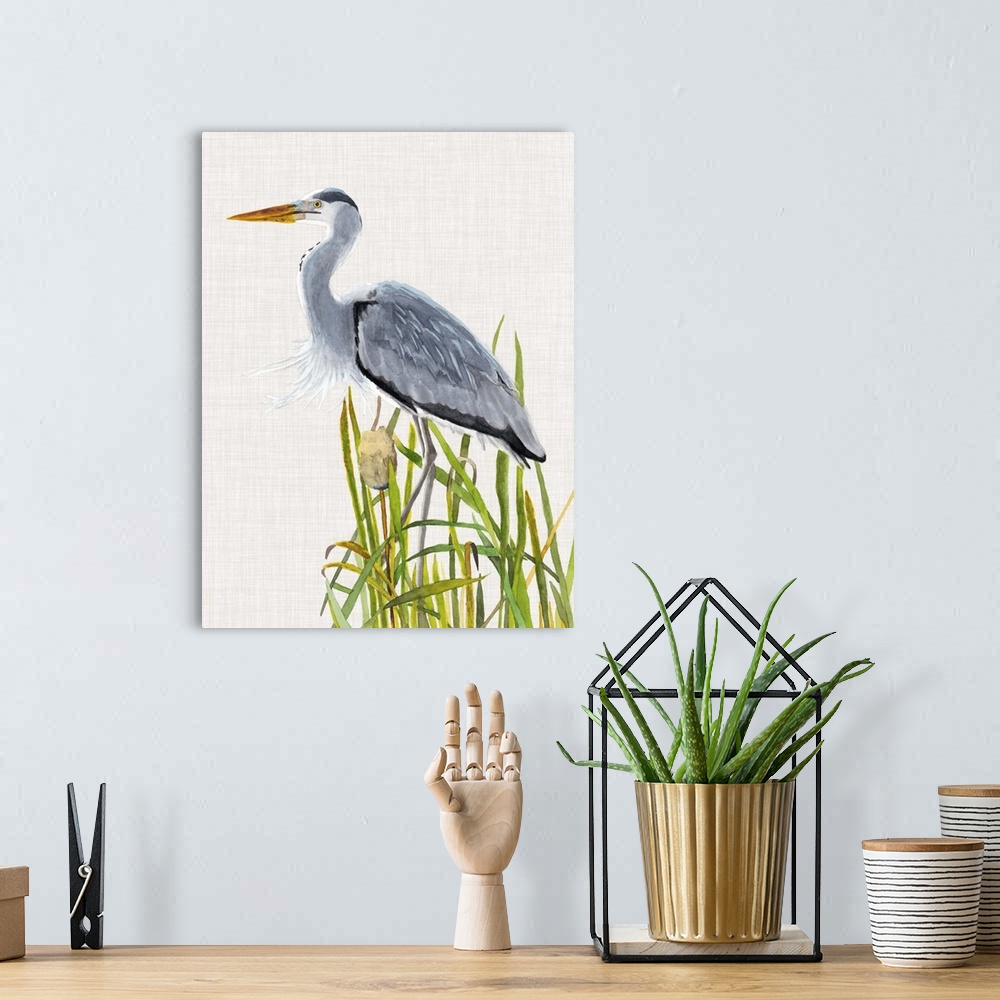 A bohemian room featuring Painting of a heron standing in tall reeds.