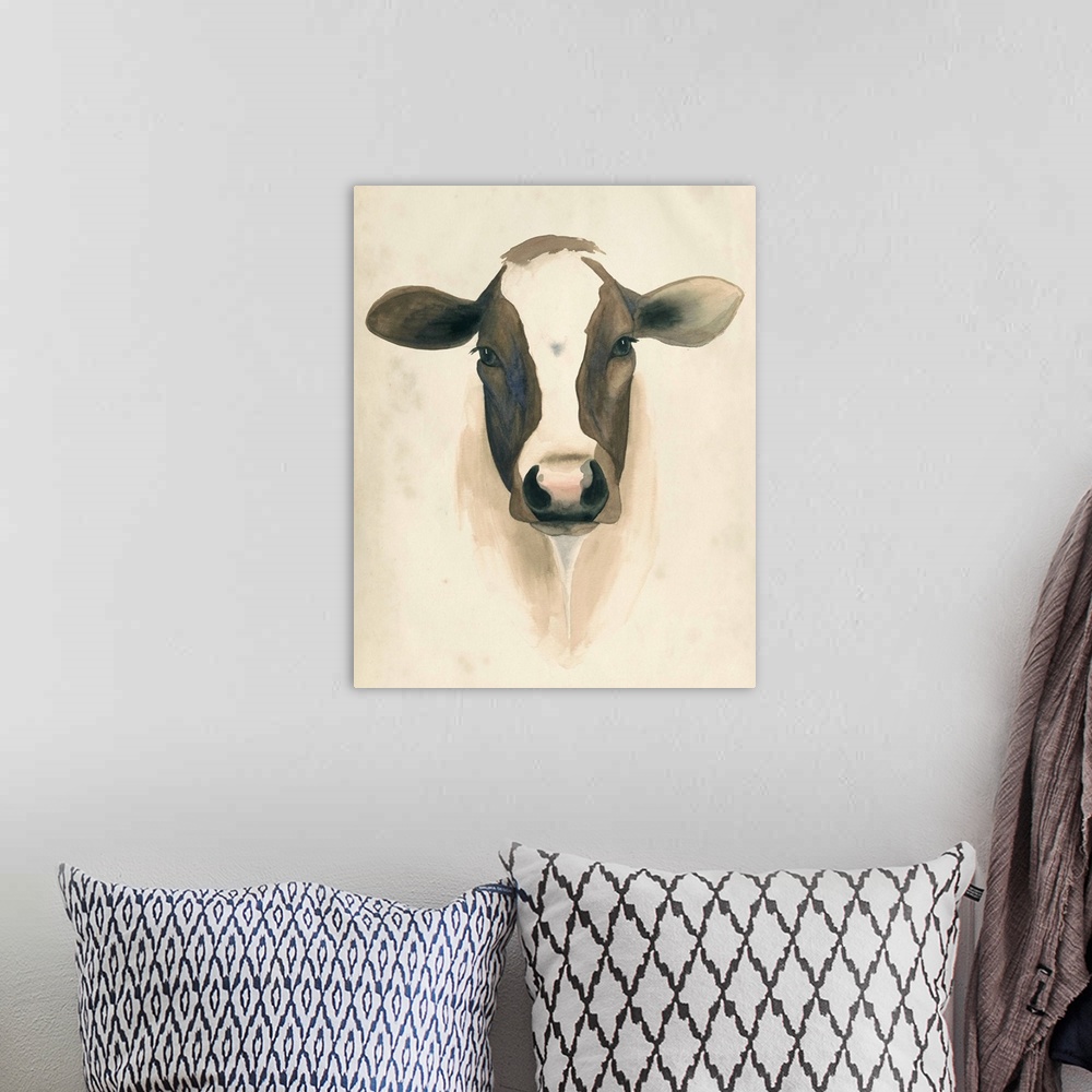 A bohemian room featuring Watercolor painting of a dairy cow.