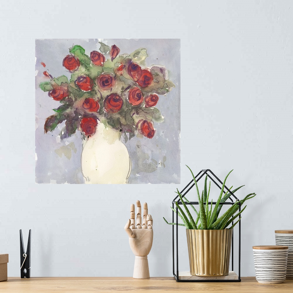 A bohemian room featuring Watercolor painting of a bouquet of red roses in a white vase.