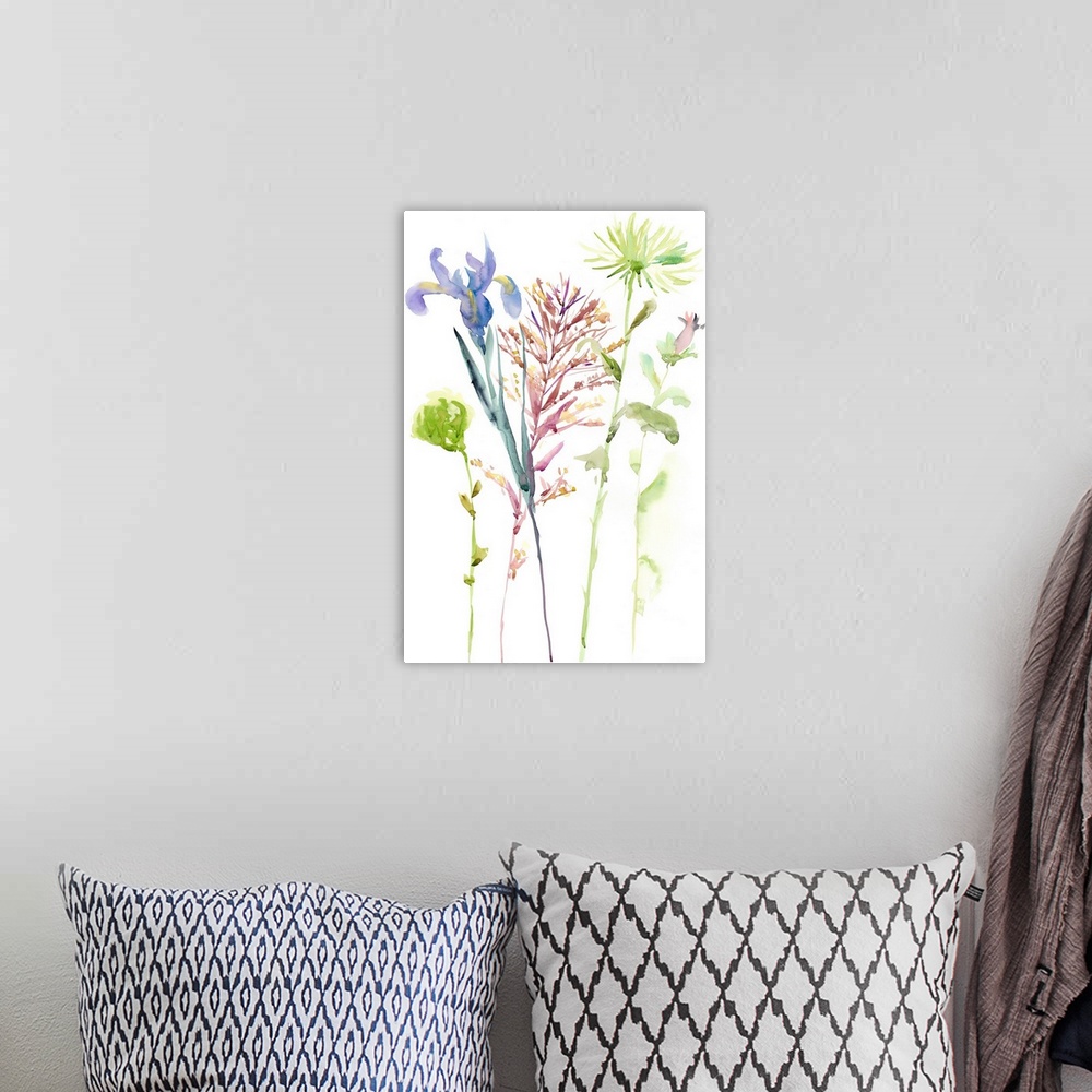 A bohemian room featuring Watercolor art print of spring flowers in pink and blue with light green leaves.