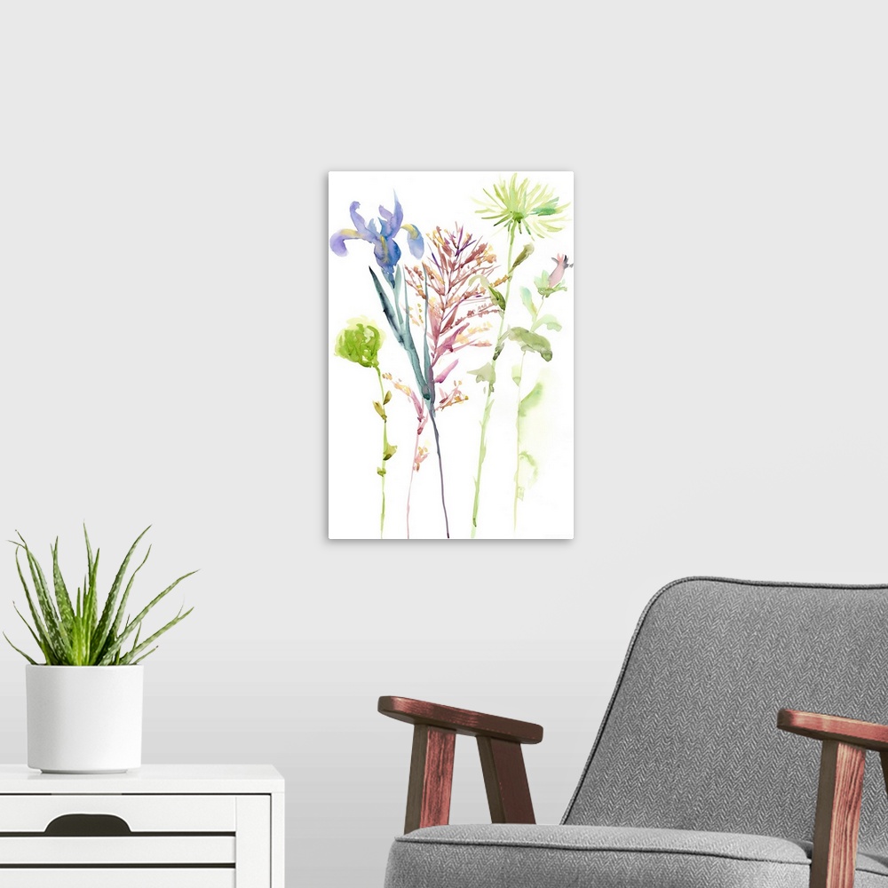 A modern room featuring Watercolor art print of spring flowers in pink and blue with light green leaves.