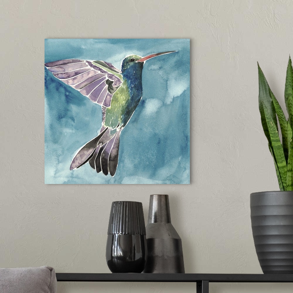 A modern room featuring Watercolor painting of a hummingbird against a blue background.