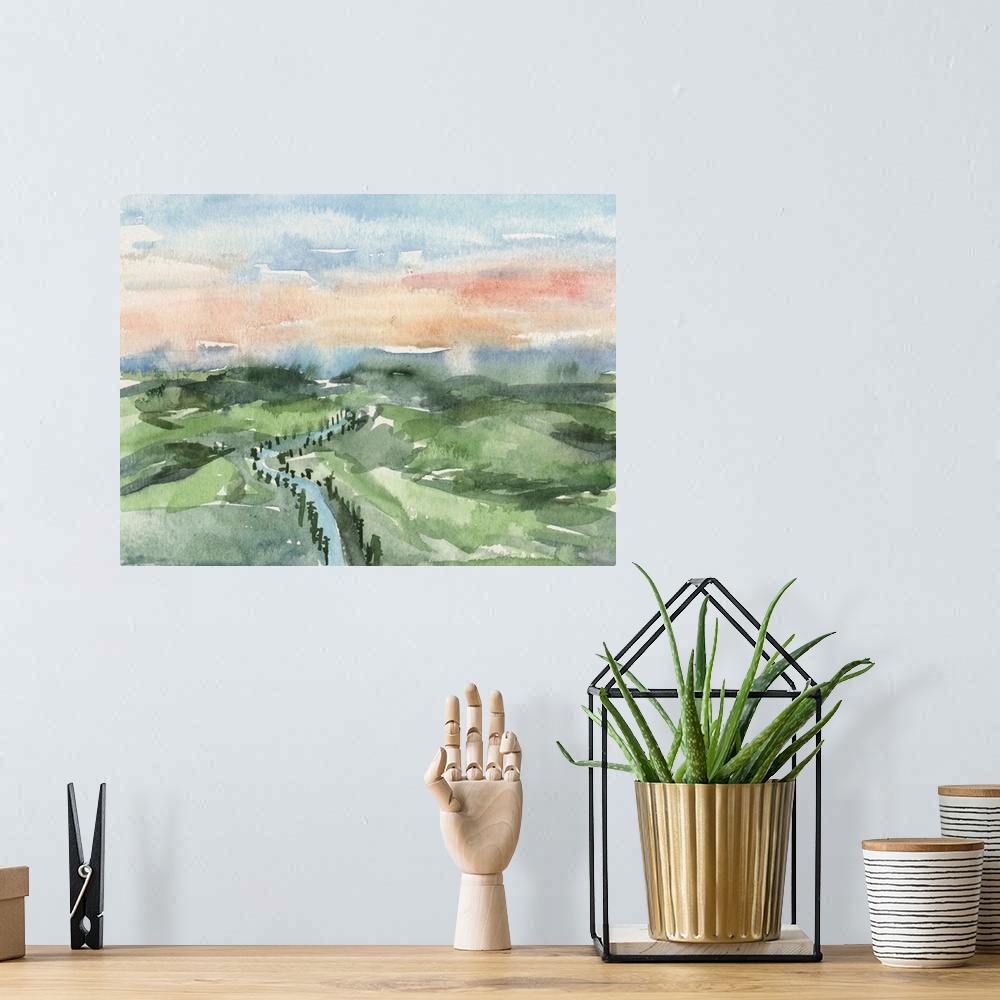 A bohemian room featuring Contemporary watercolor landscape of a river running through a hilly landscape.