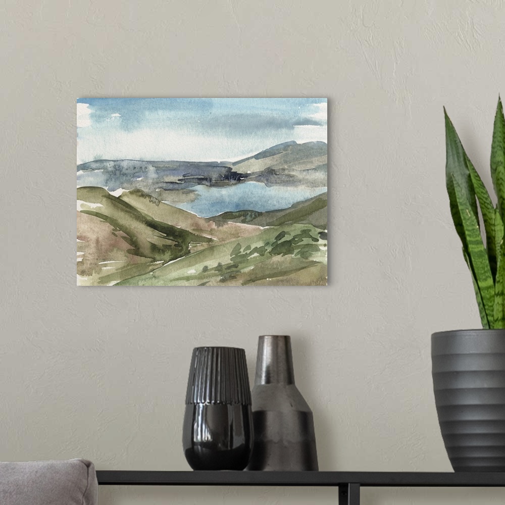 A modern room featuring Contemporary watercolor landscape of a lake surrounded by a mountainous landscape.