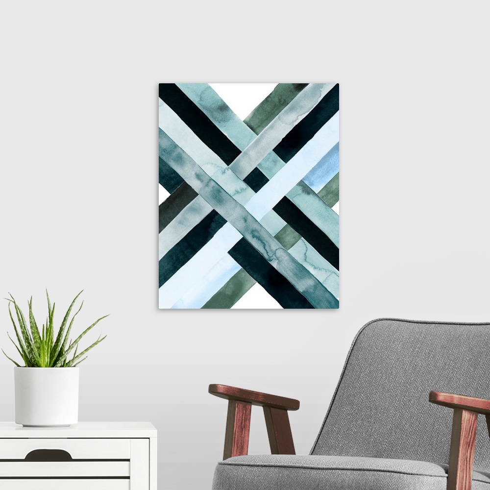 A modern room featuring Abstract watercolor artwork of woven bands in black and blue shades, forming an X shape.