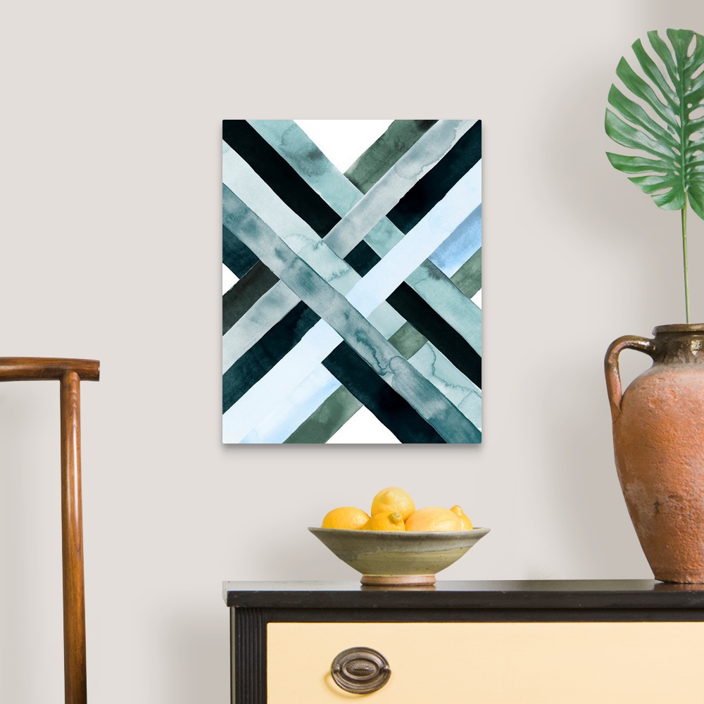 A traditional room featuring Abstract watercolor artwork of woven bands in black and blue shades, forming an X shape.