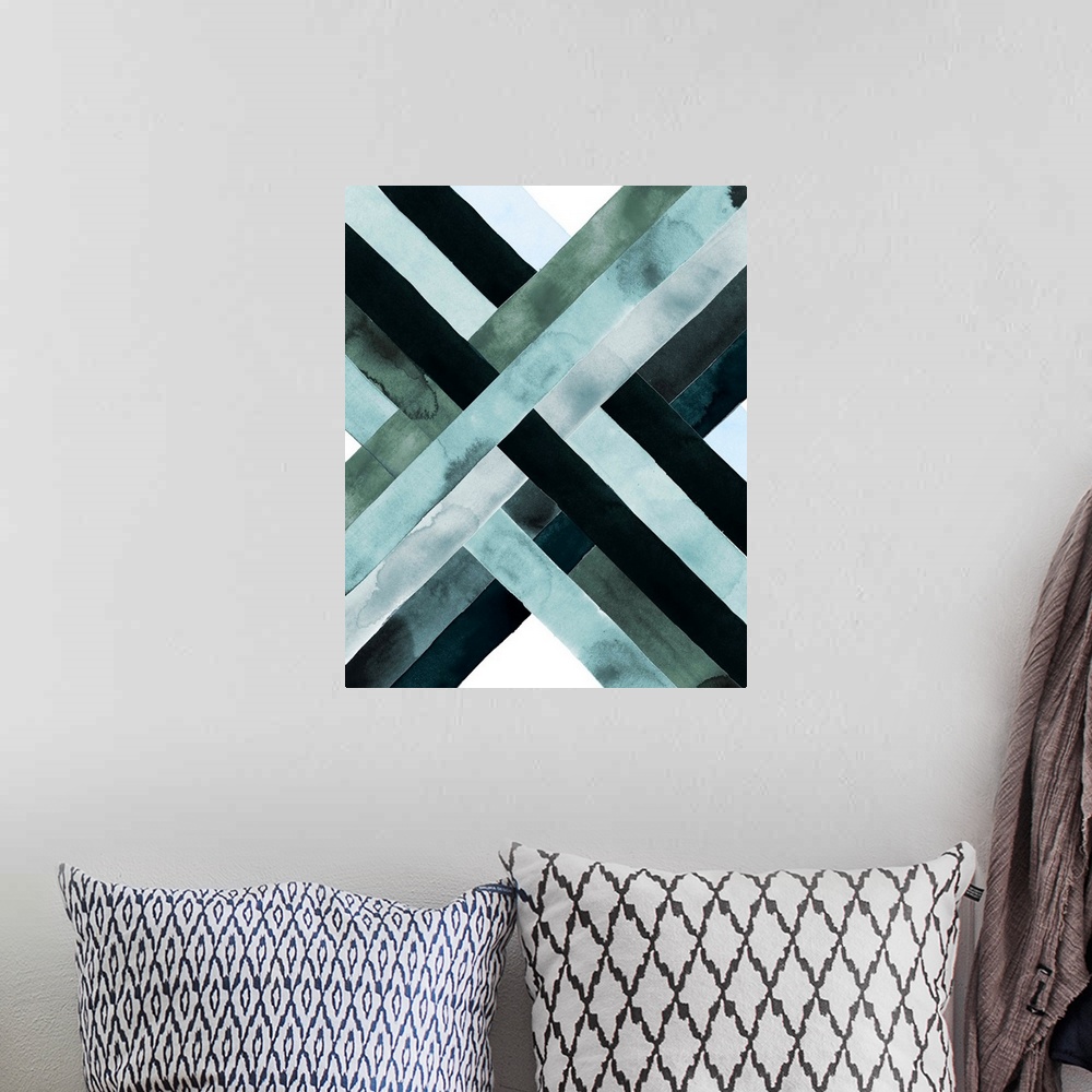 A bohemian room featuring Abstract watercolor artwork of woven bands in black and blue shades, forming an X shape.