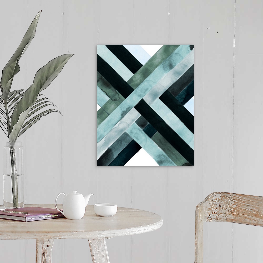 A farmhouse room featuring Abstract watercolor artwork of woven bands in black and blue shades, forming an X shape.