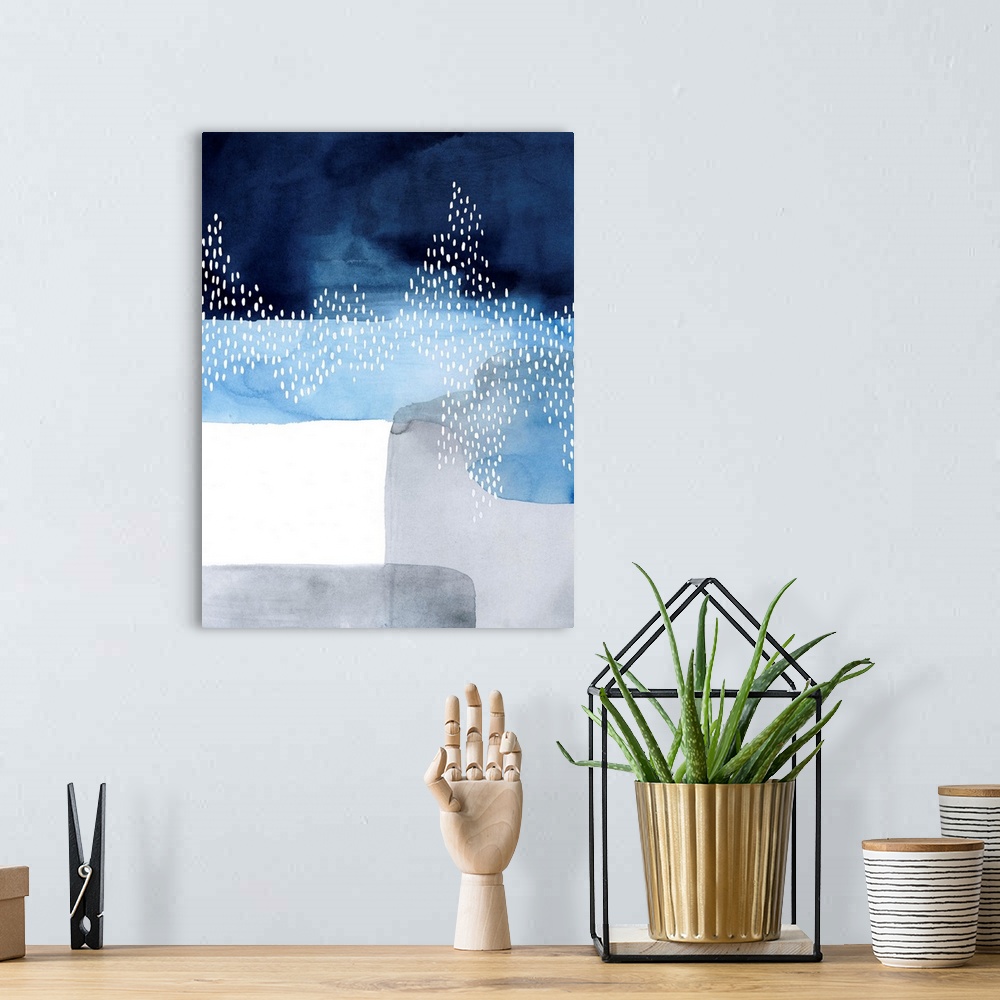 A bohemian room featuring Abstract watercolor painting of blocks of blue and grey color with a white dot pattern.