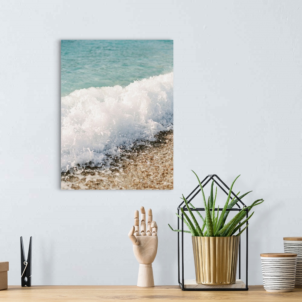 A bohemian room featuring Photograph of a small wave breaking on a sandy beach, Corfu, Greece.