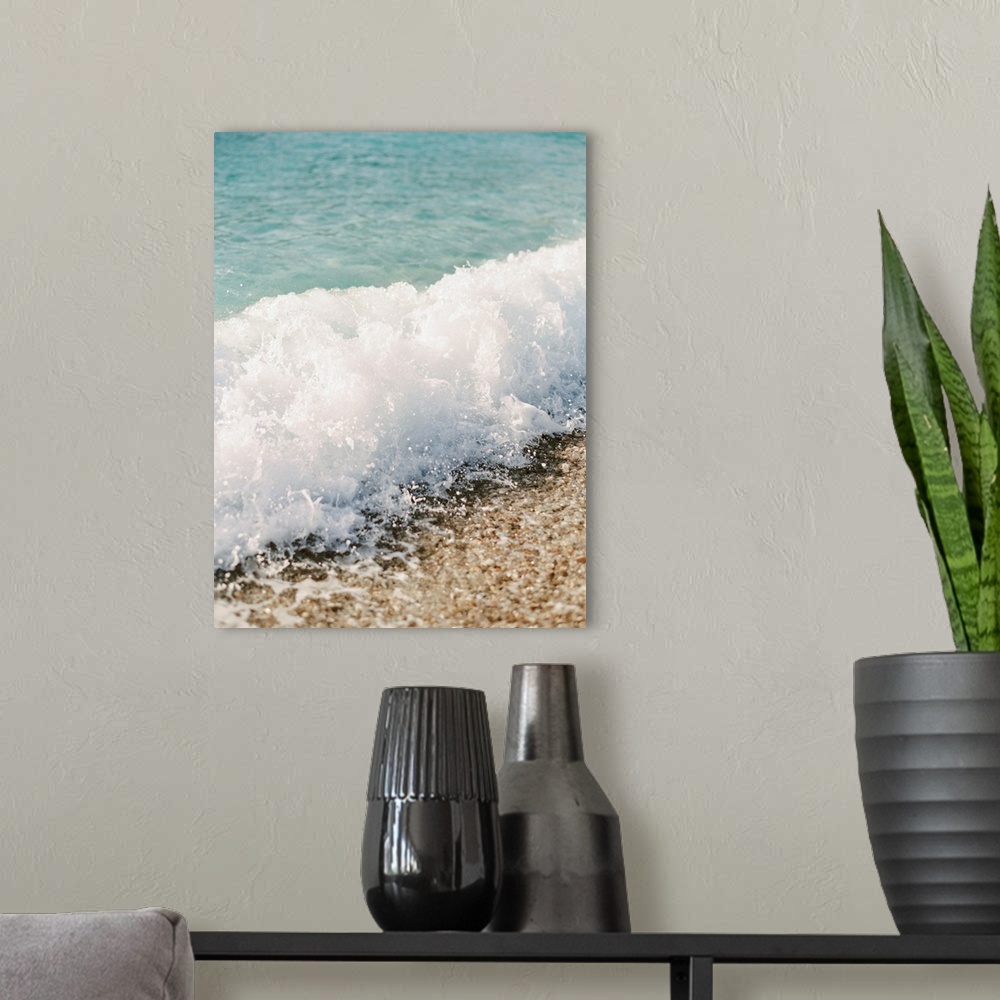 A modern room featuring Photograph of a small wave breaking on a sandy beach, Corfu, Greece.