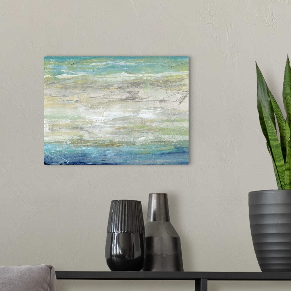 A modern room featuring This abstract artwork expresses the turmoil of waves on the ocean by using a ranges of blues and ...