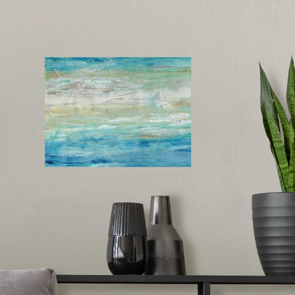 A modern room featuring This abstract artwork expresses the turmoil of waves on the ocean by using a ranges of blues and ...