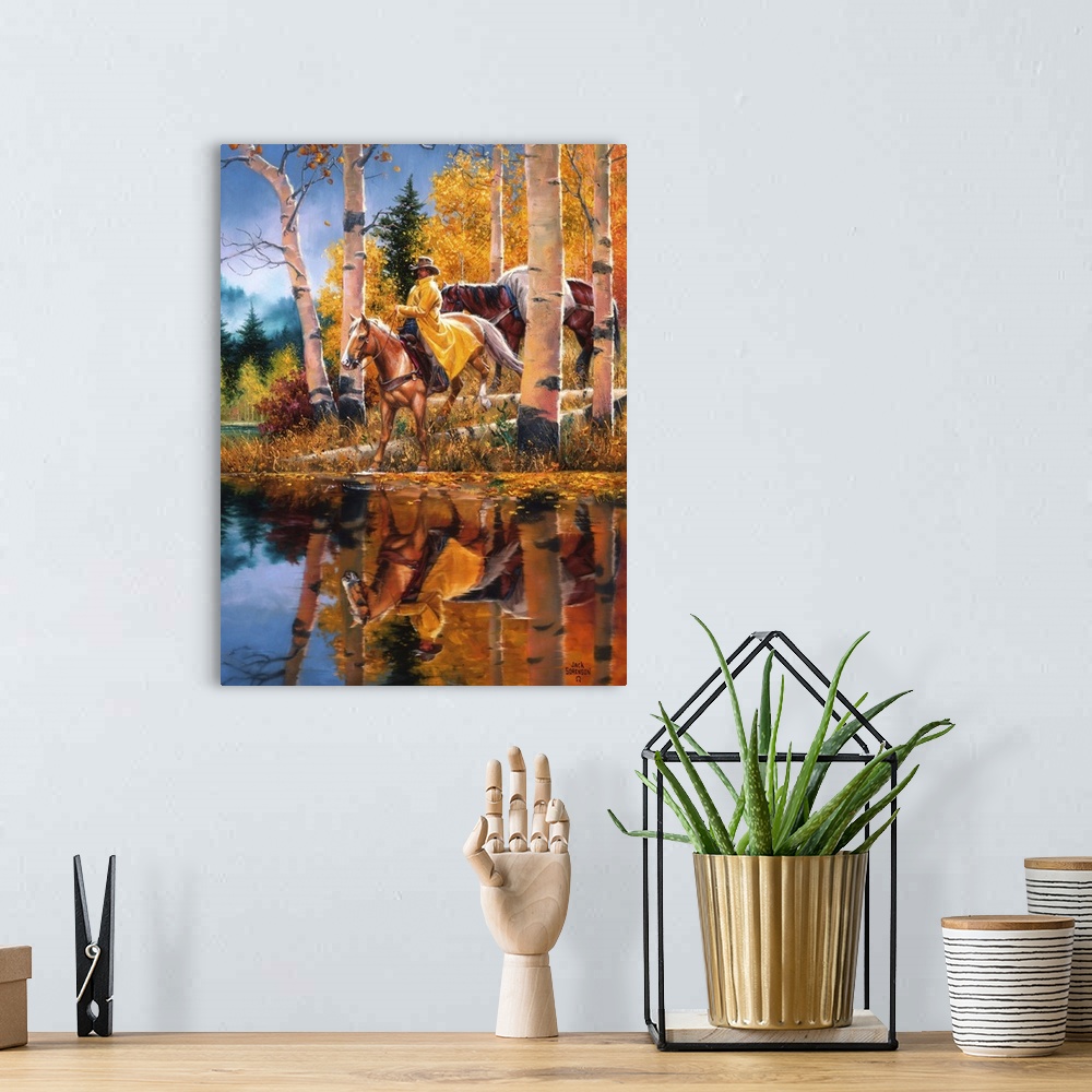 A bohemian room featuring Contemporary Western artwork of a rider on horseback at a riverbank near some aspen trees in the ...