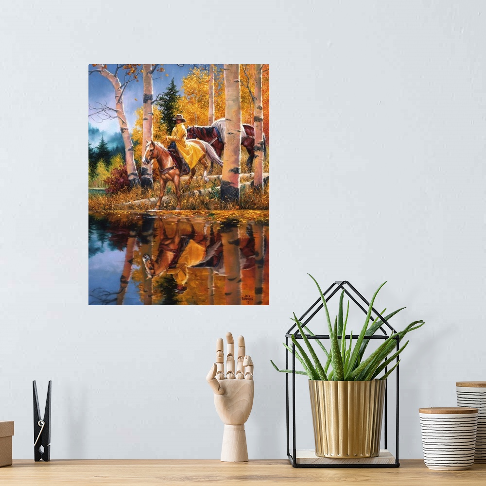 A bohemian room featuring Contemporary Western artwork of a rider on horseback at a riverbank near some aspen trees in the ...