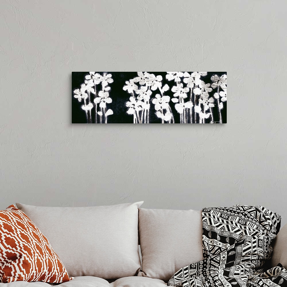 A bohemian room featuring White Flowers on Black I