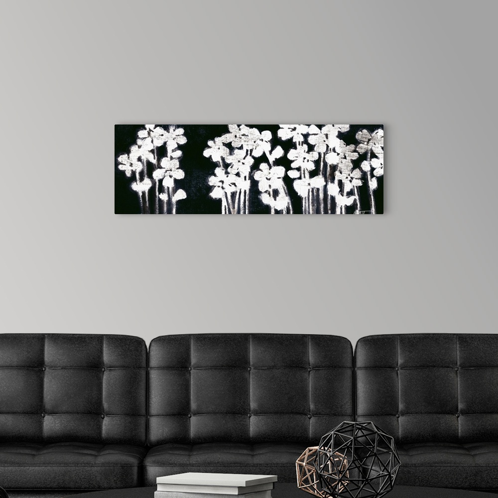 A modern room featuring White Flowers on Black I