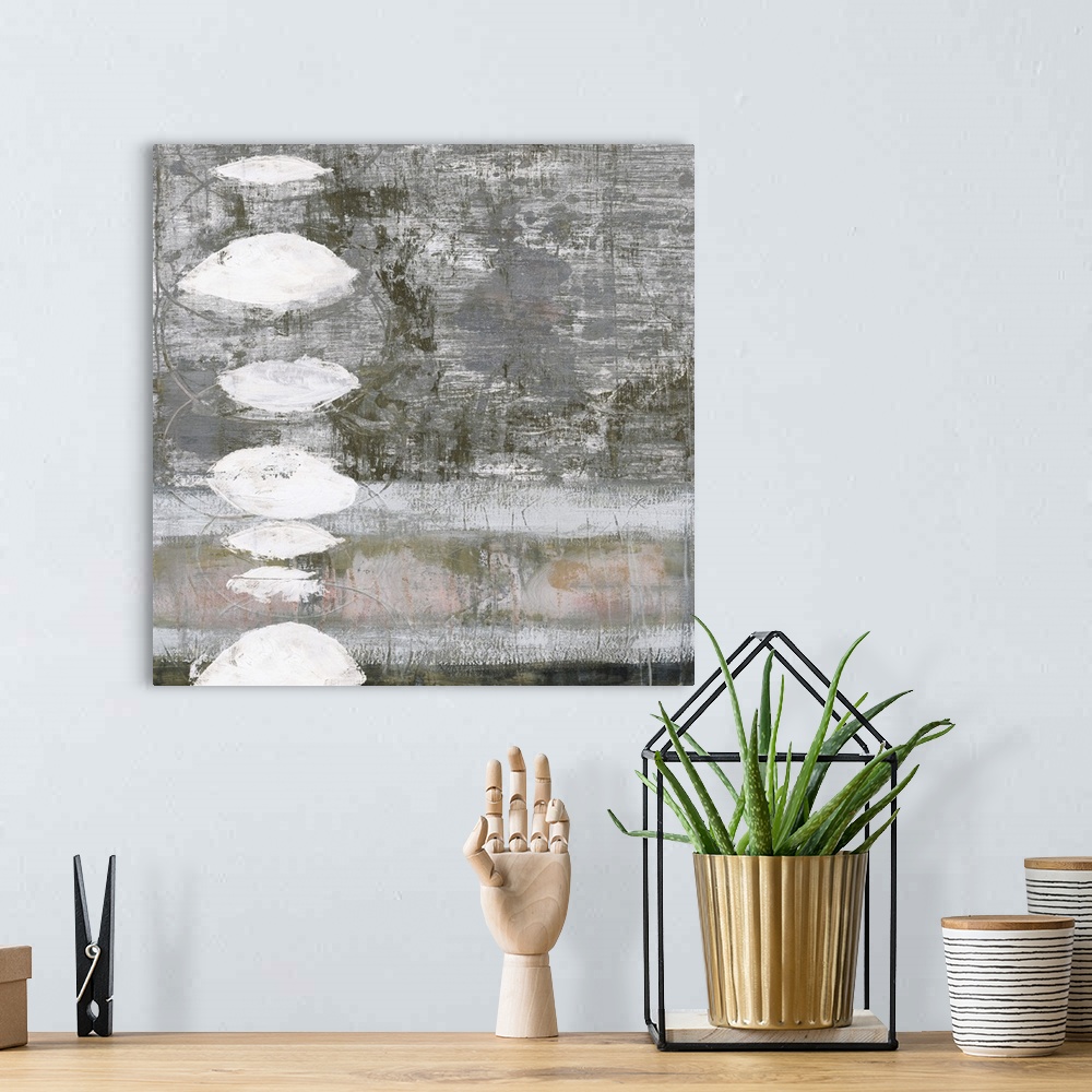 A bohemian room featuring Abstract painting using neutral tones and textured shapes.
