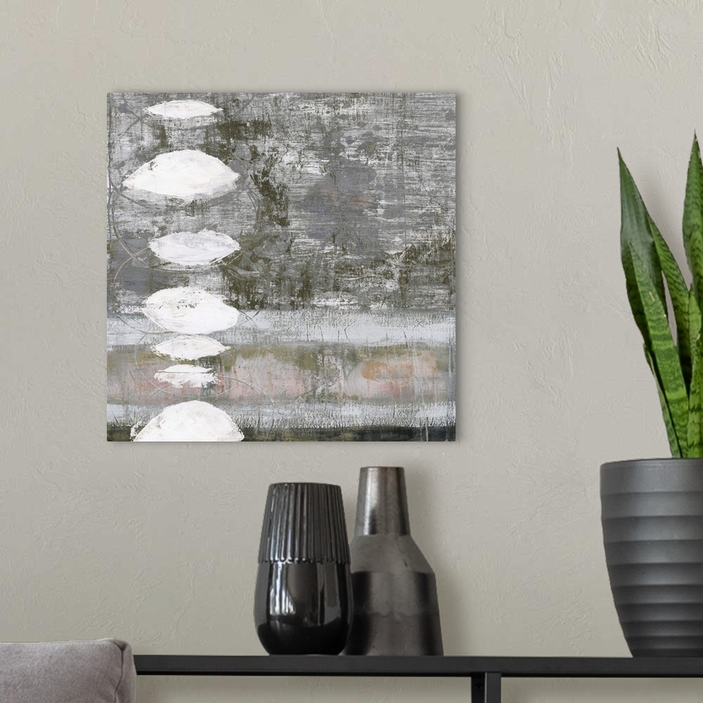 A modern room featuring Abstract painting using neutral tones and textured shapes.