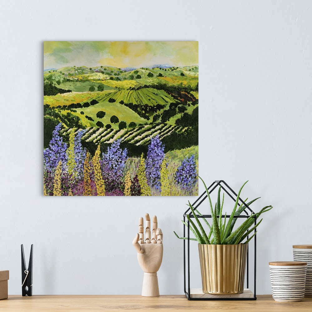 A bohemian room featuring Contemporary painting of a country landscape with lilacs overlooking rows of crops and hilly farm...