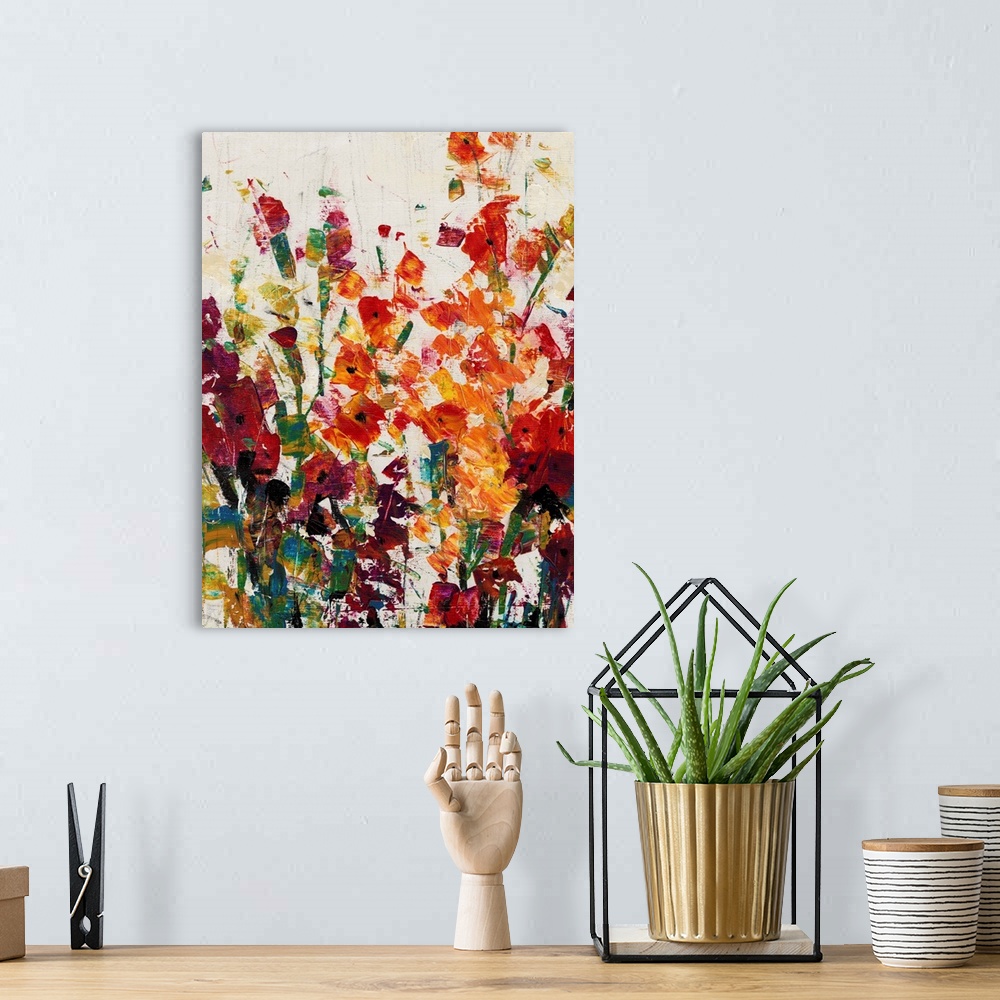 A bohemian room featuring Contemporary painting of a group of vibrant flowers.