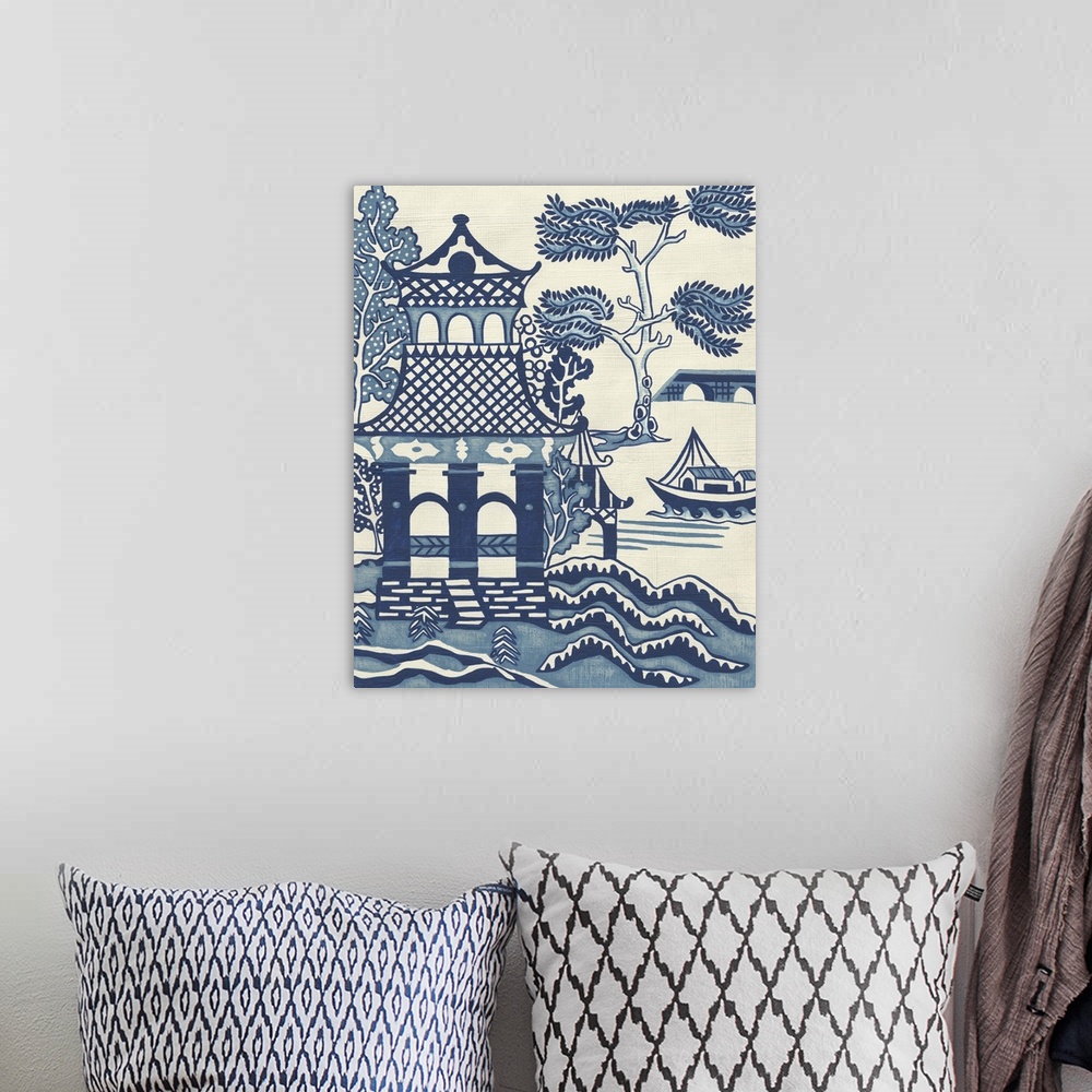 A bohemian room featuring Asian-style painting of a temple by the ocean.
