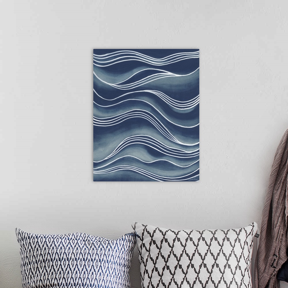 A bohemian room featuring Wavy white lines over shades of blue create the illusion of rolling waves.