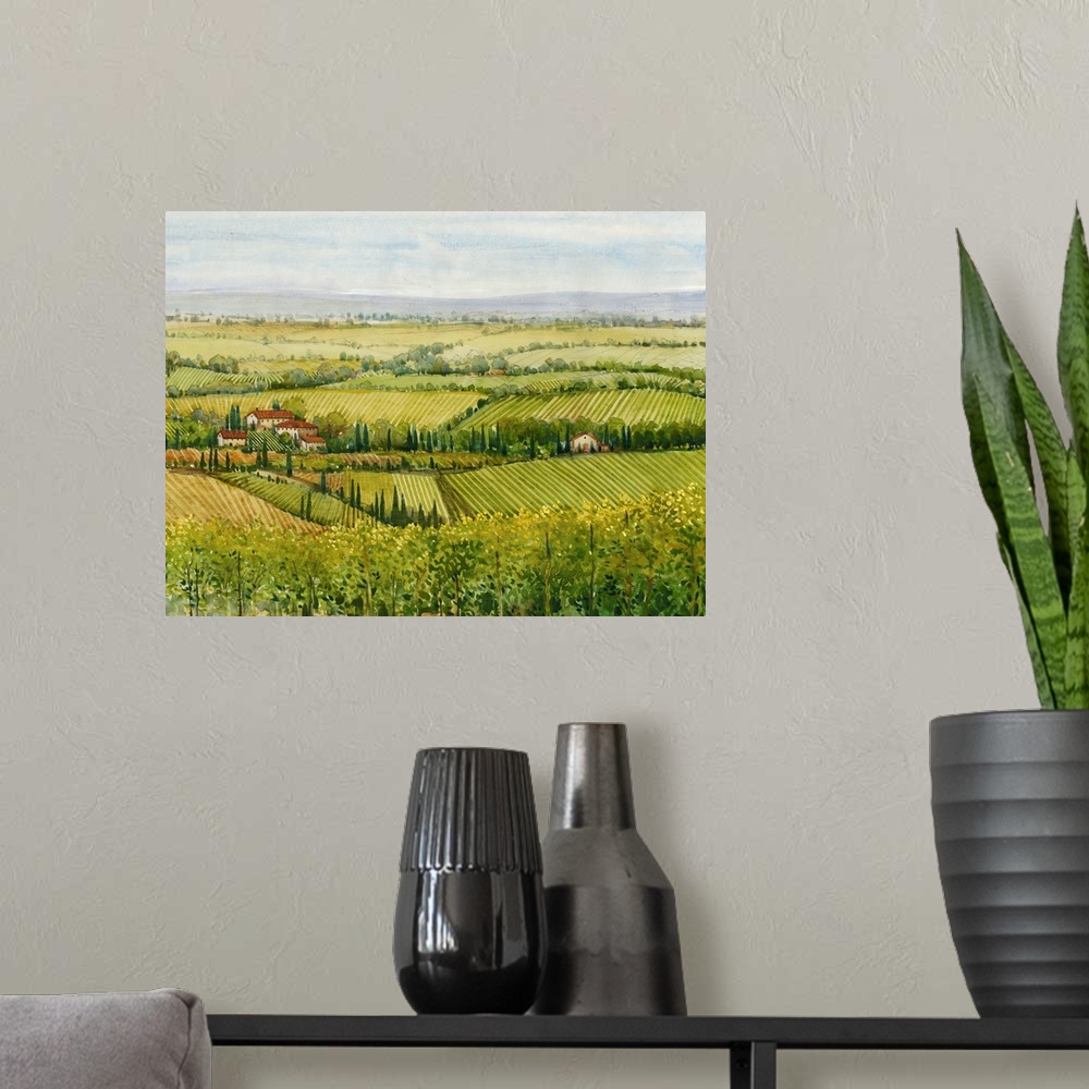 A modern room featuring In this painting, vast ranges of greens and yellows dapple this homely landscape of a Tuscan coun...