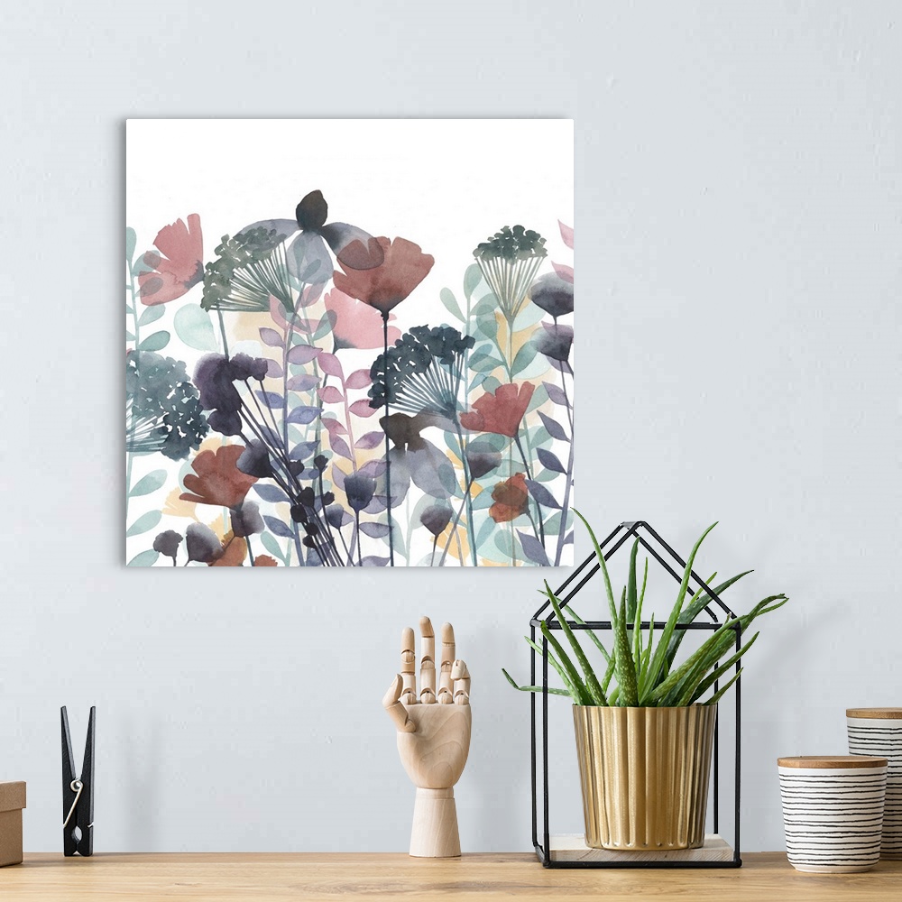 A bohemian room featuring Watercolor painting of a line-up of multi-colored flowers against a white background.