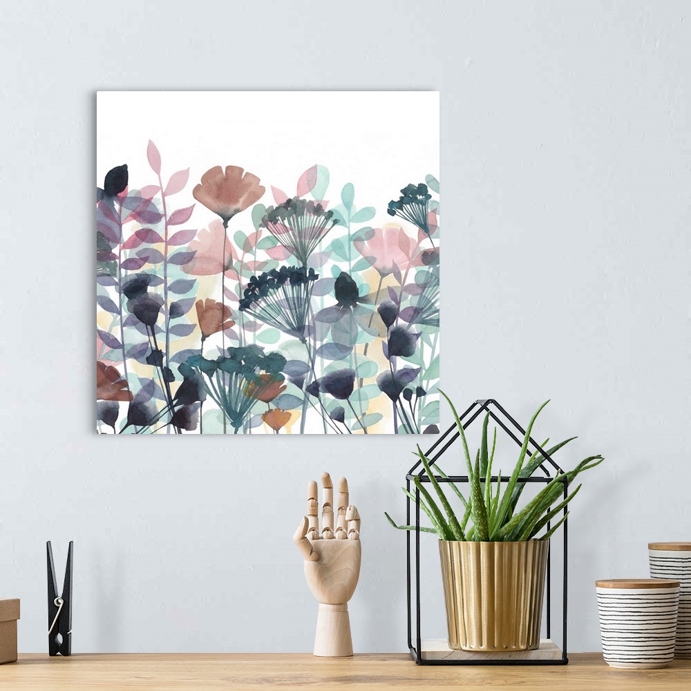 A bohemian room featuring Watercolor painting of a line-up of multi-colored flowers against a white background.