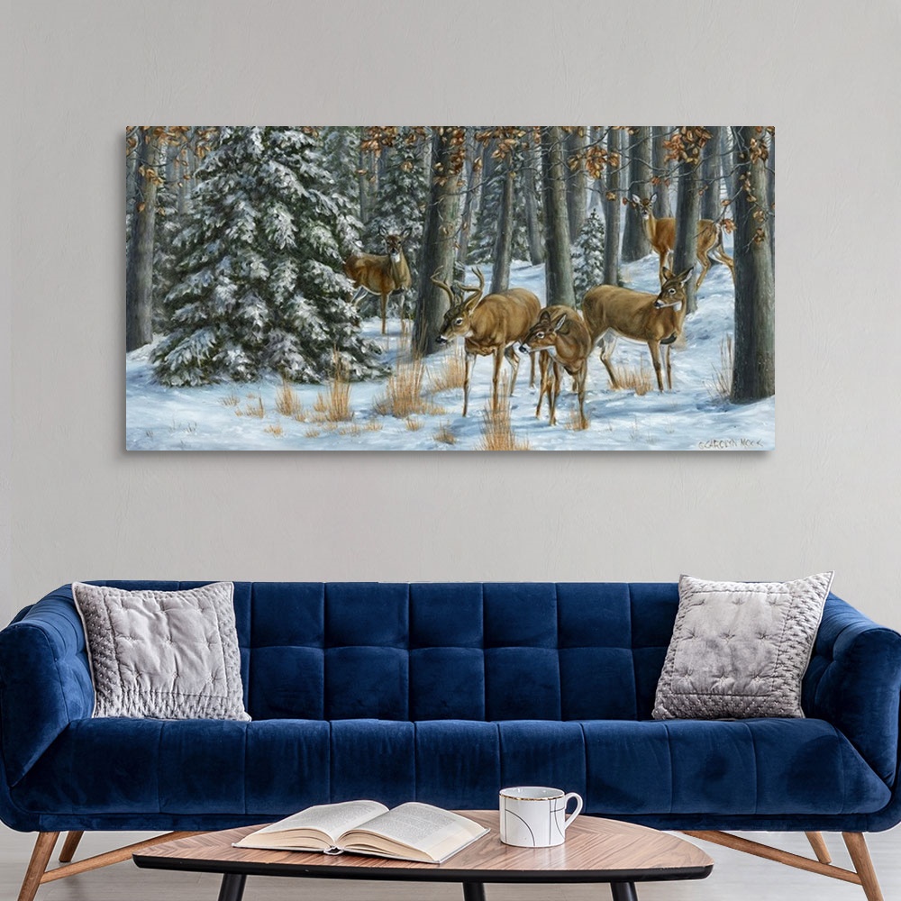 A modern room featuring Contemporary painting of deer grazing in a snow covered forest.