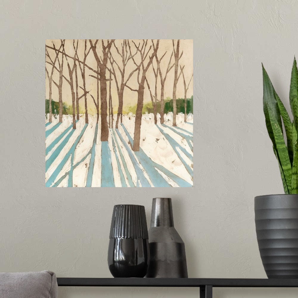 A modern room featuring Contemporary painting of a winter snowscape with the shadows of the trees in the foreground.
