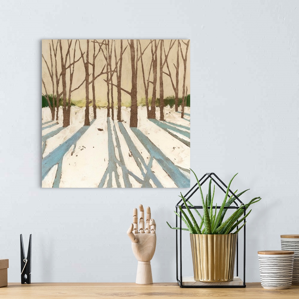 A bohemian room featuring Contemporary painting of a winter snowscape with the shadows of the trees in the foreground.