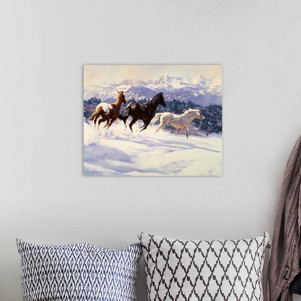 A bohemian room featuring Contemporary colorful painting of a herd of horses running through a snowy meadow, with a mountai...
