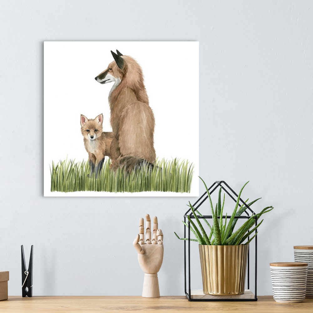 A bohemian room featuring Watercolor portrait of a fox and its kit on a grassy landscape.