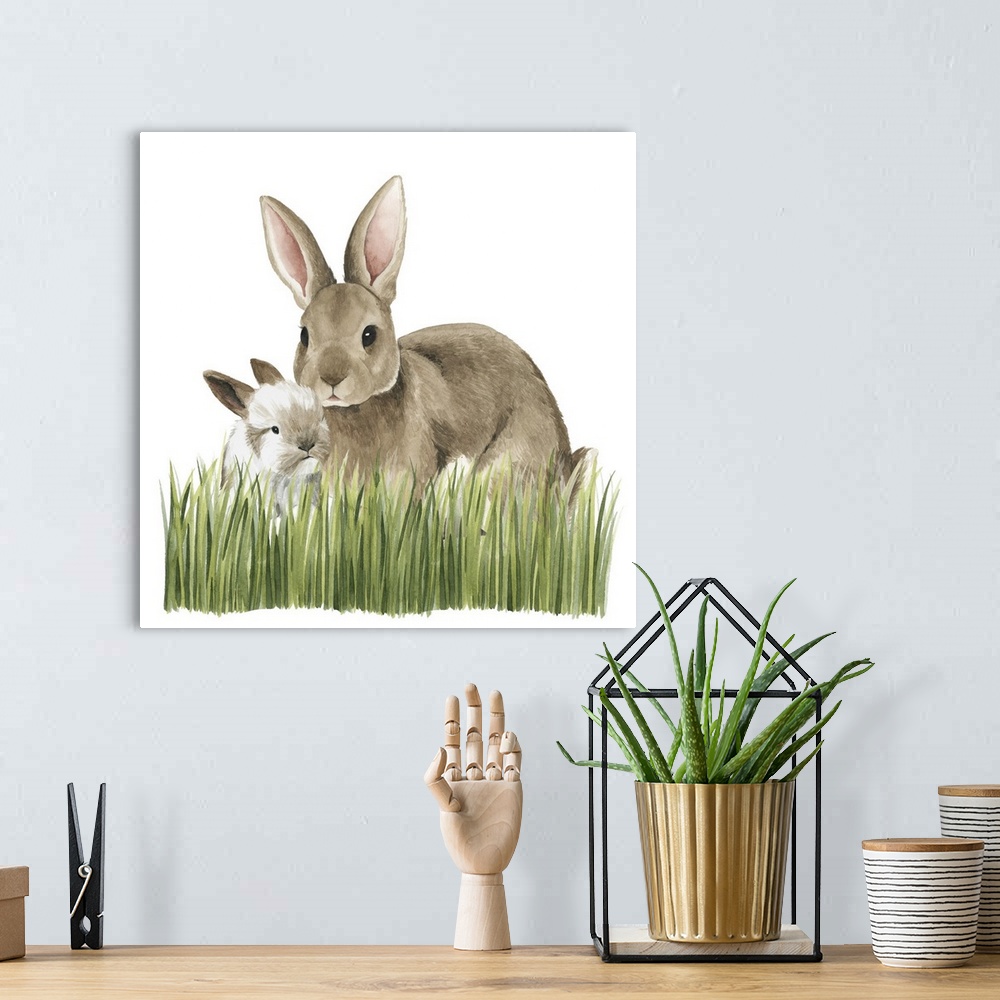 A bohemian room featuring Watercolor portrait of a rabbit and its kit on a grassy landscape.