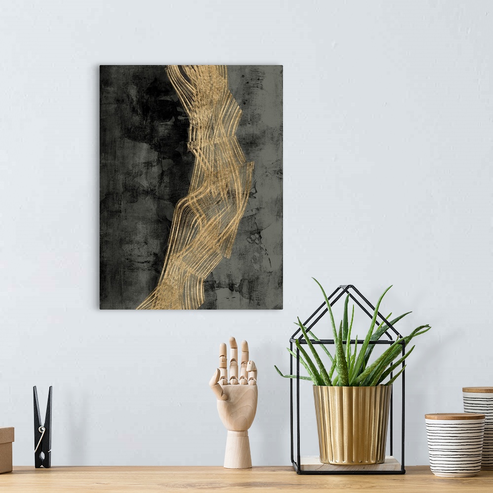 A bohemian room featuring Abstract contemporary artwork with gold wavy lines crossing through dark grey.