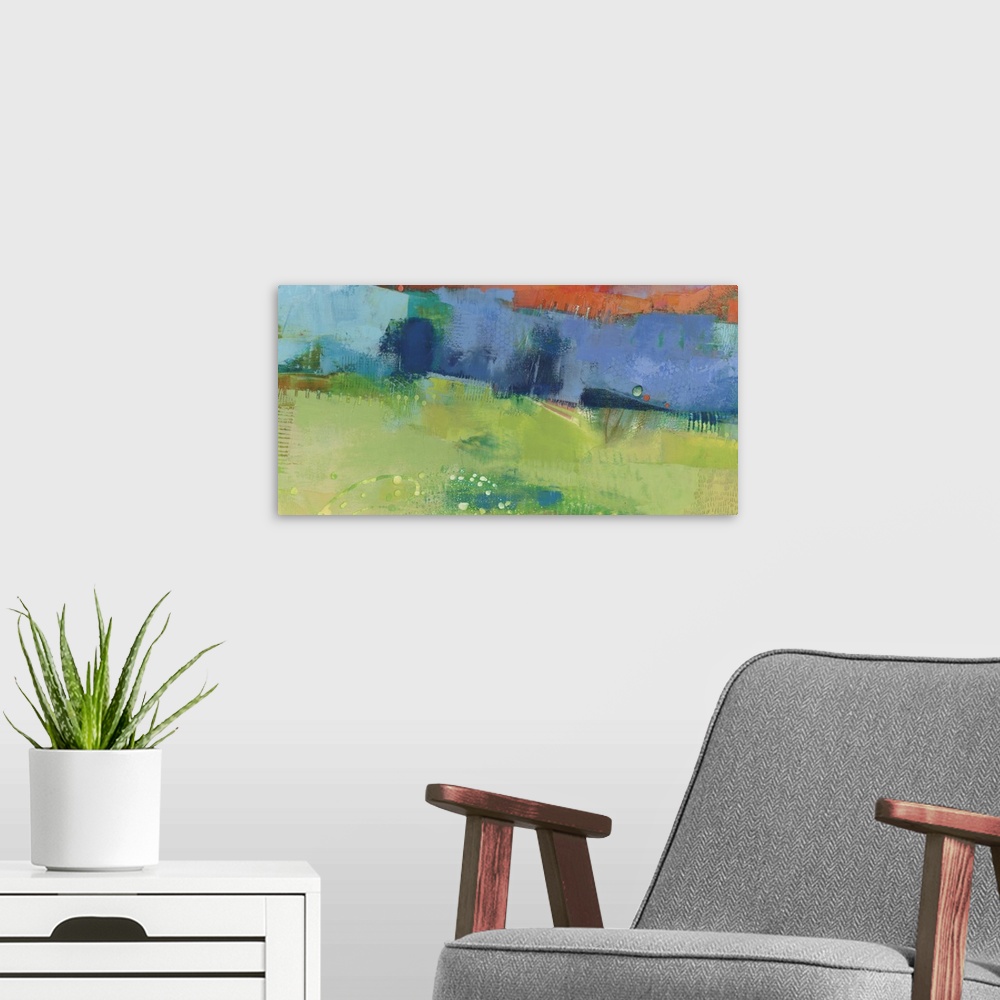 A modern room featuring Abstract modern art print in cheerful shades of blue, orange, and green.