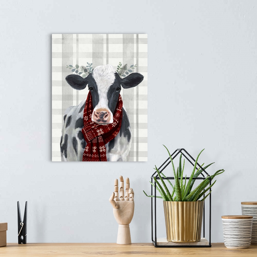 A bohemian room featuring An amusing image of a black and white cow wearing a red scarf and branches behind ears on a gray ...