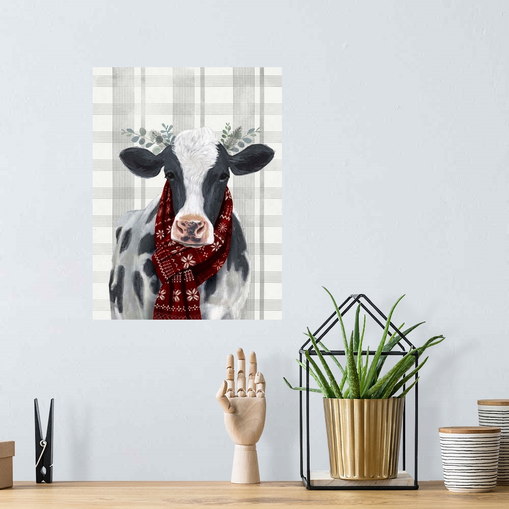 A bohemian room featuring An amusing image of a black and white cow wearing a red scarf and branches behind ears on a gray ...