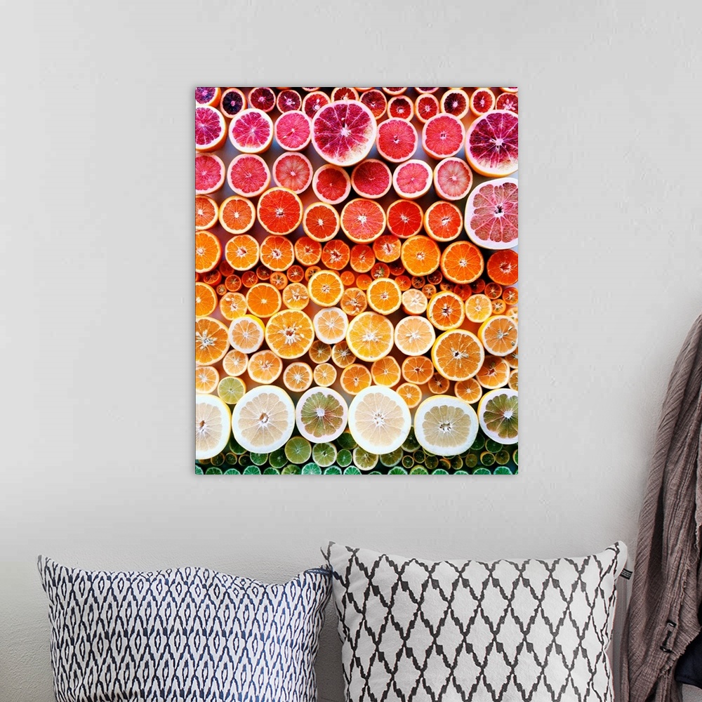 A bohemian room featuring Citrus organized neatly into a color gradient.
