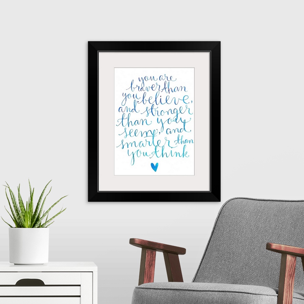 A modern room featuring A handlettered inspirational quote about not underestimating your abilities done in varying shade...