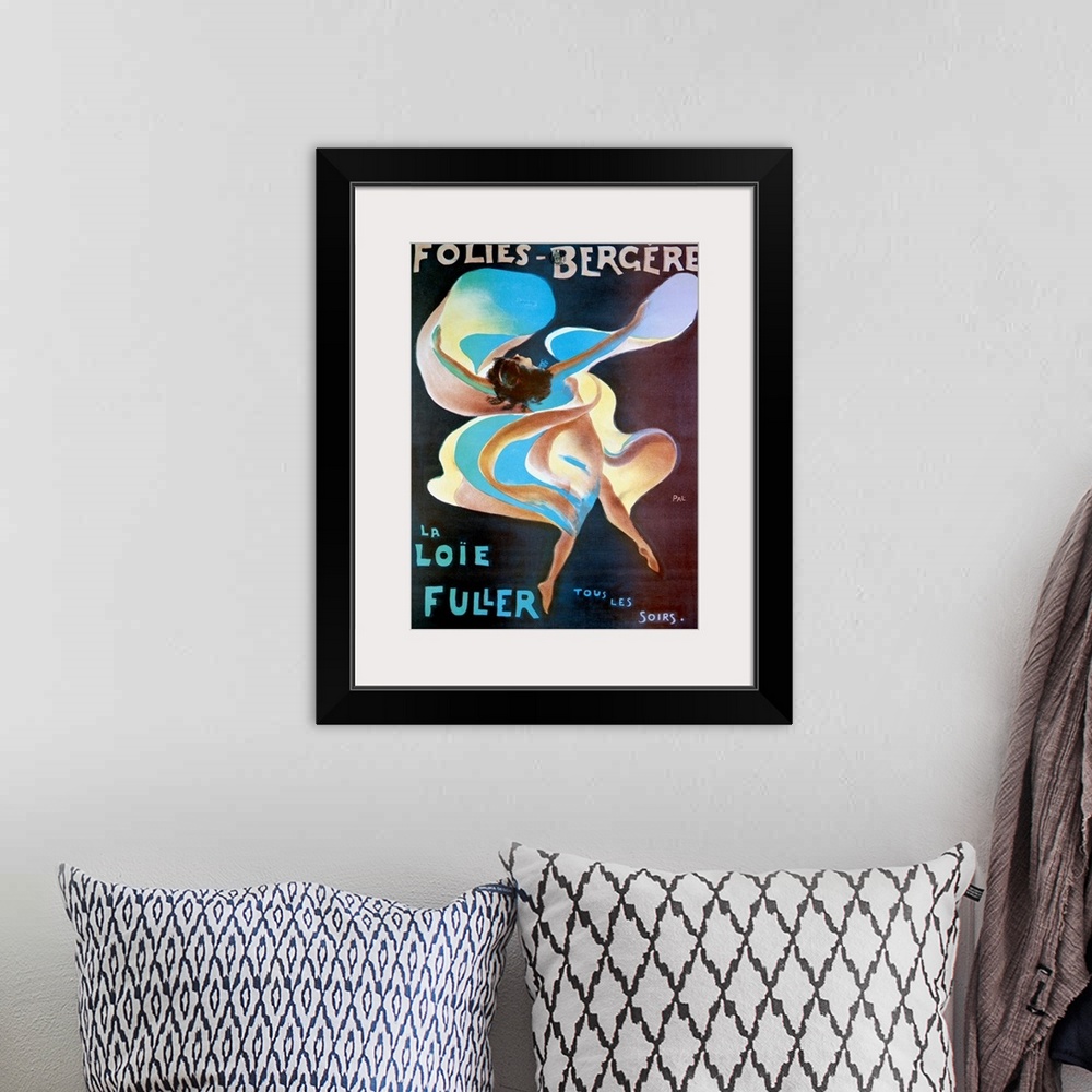 A bohemian room featuring Vintage theater poster of a woman draped in flowing fabric dancing for a live entertainment act f...