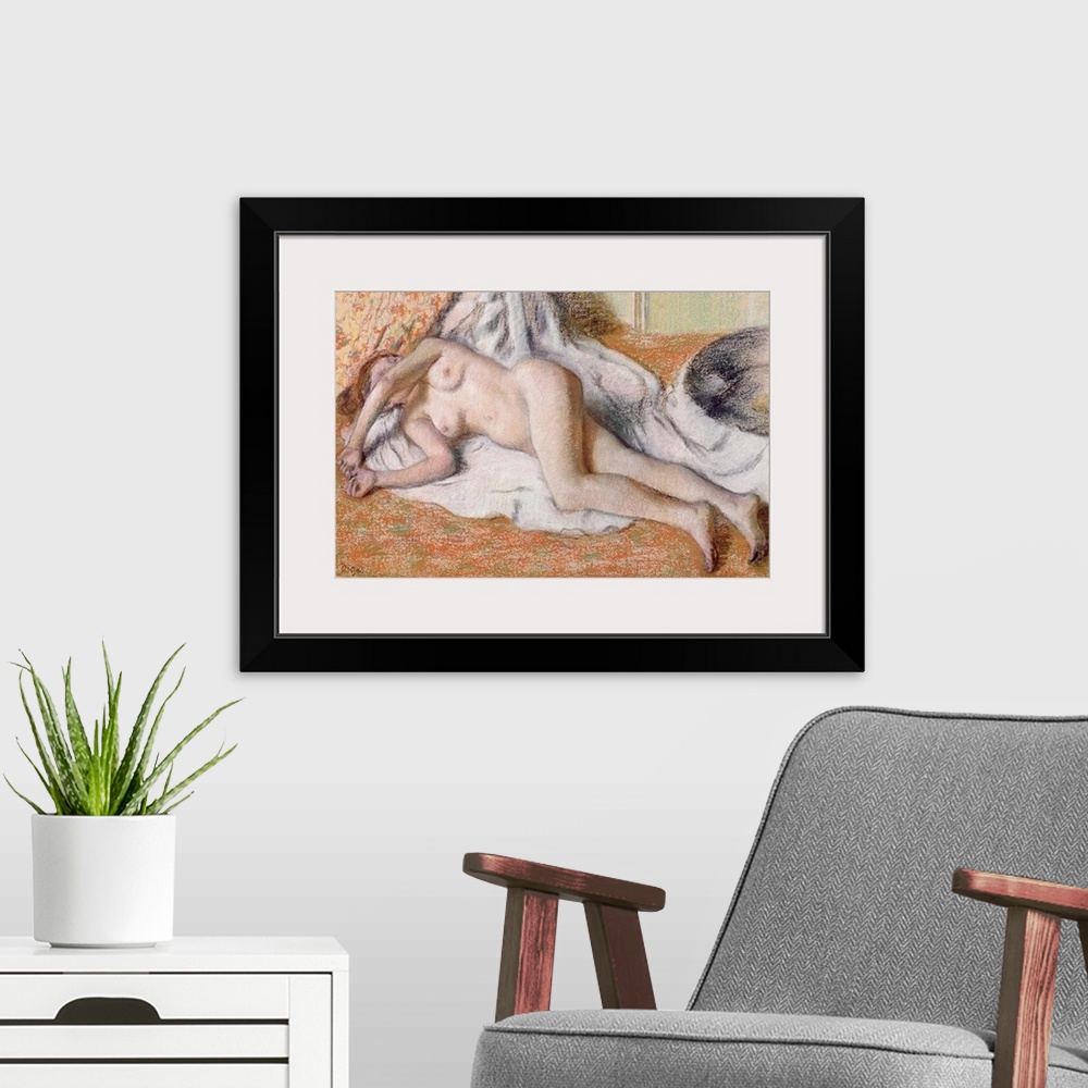 A modern room featuring Horizontal, classic artwork on a big canvas of a nude woman lying on her side on a draping white ...