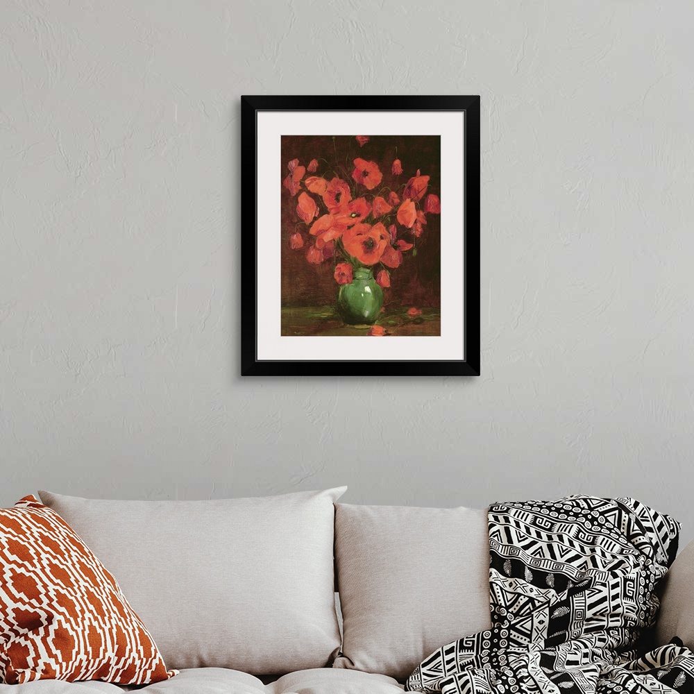 A bohemian room featuring Classic art painting of a green vase filled with giant red poppy flowers.