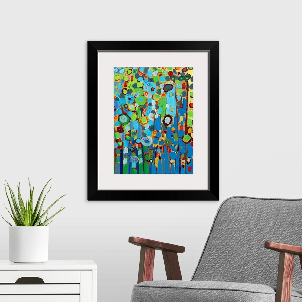 A modern room featuring Large portrait abstract painting of a variety of circular flowers growing vertically in mainly co...