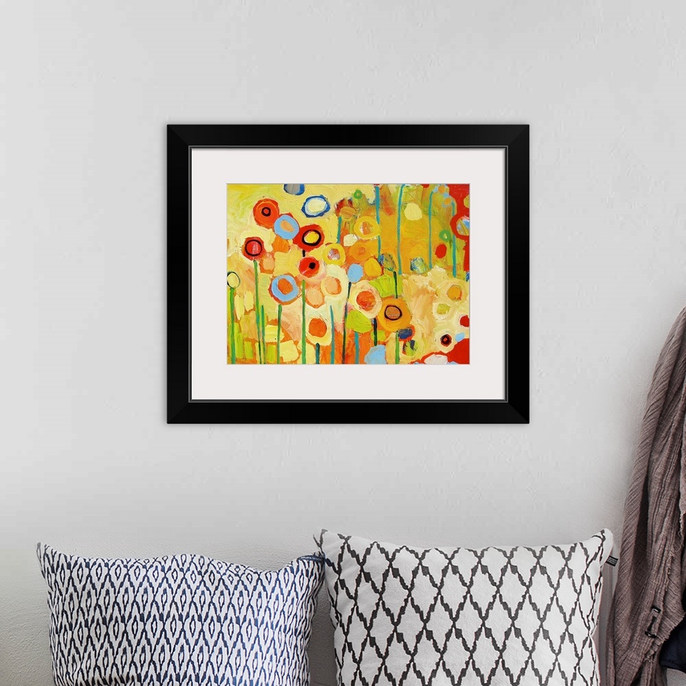 A bohemian room featuring An abstract still life of colorful circles and lines representing flowers and stems.