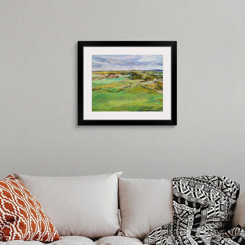 A bohemian room featuring Beautiful oil painting of land in Scotland with various colors used for the field, mountains and ...