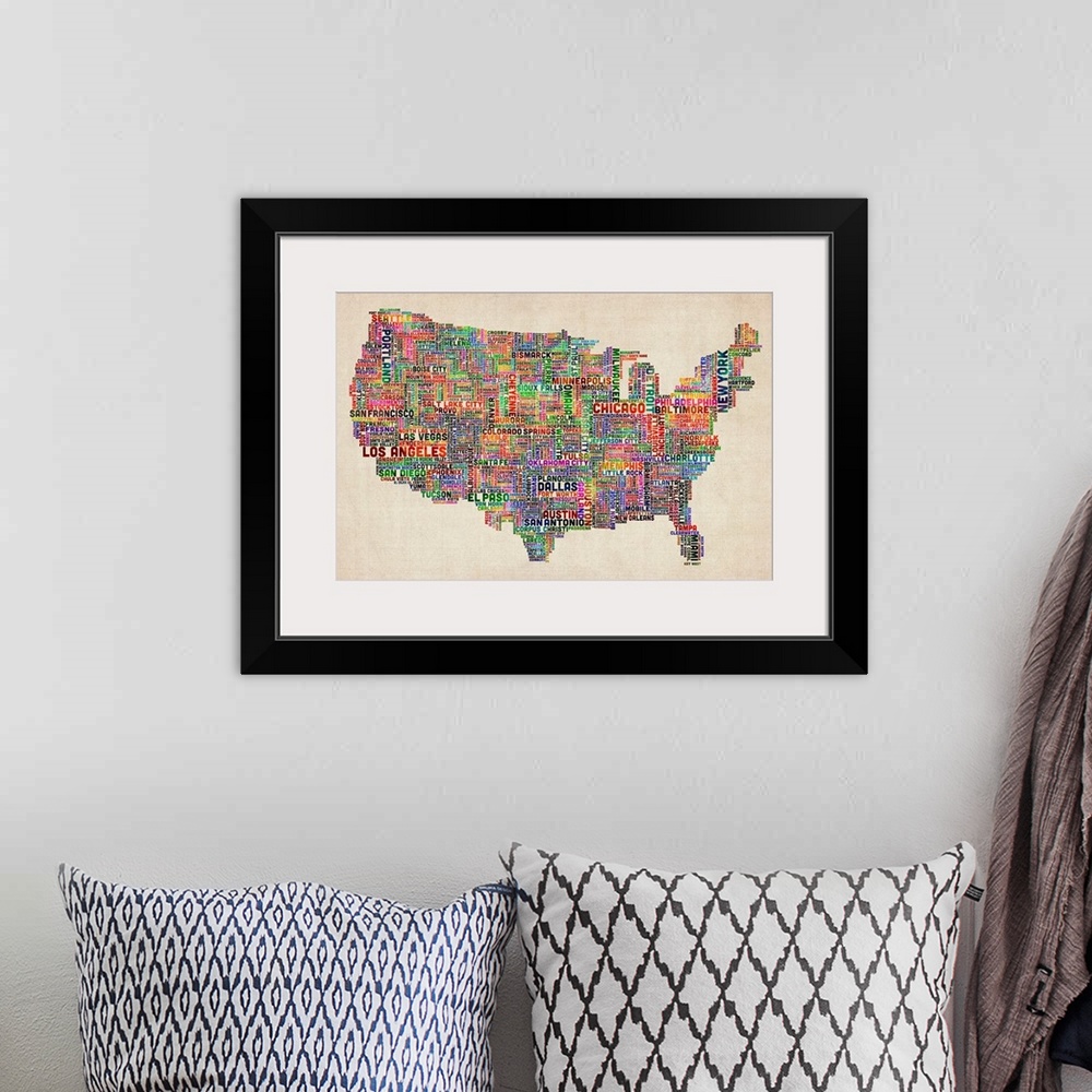 A bohemian room featuring Colorful map of America constructed using the names of each U.S. city.